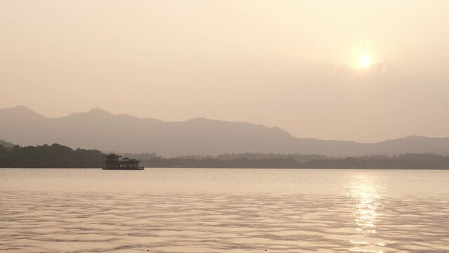 beautiful landscape of west lake at sunset in hangzhou