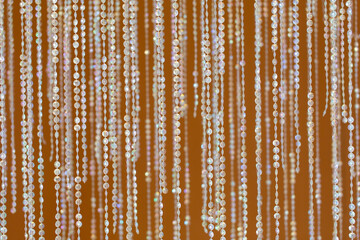 crystal bead curtain on a yellow background