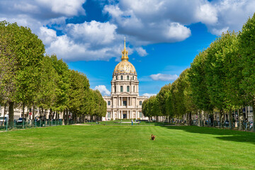 Fototapeta na wymiar Beautiful view of the golden dome of Les Invalides from the public park in Paris, France