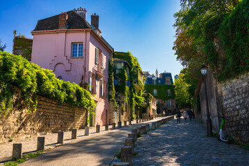 View of old street in quarter Montmartre in Paris, France. Cozy cityscape of Paris. Architecture...