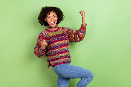 Photo of hooray millennial valume hairdo lady yell wear colorful pullover isolated on green color background