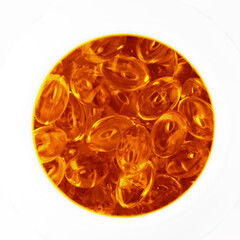 The tablets are bright yellow on a white background. View from above. Closeup