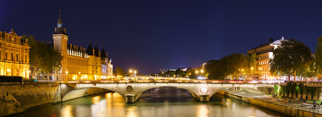 Pont au Change bridge near The Conciergerie palace and prison by the Seine river night, Paris. France - obrazy, fototapety, plakaty