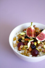 Cottage cheese with fruit figs and nuts for the breakfast in the morning 