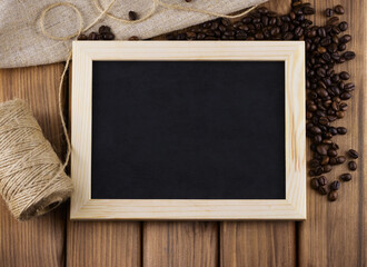 Top view of empty blackboard with different art objects