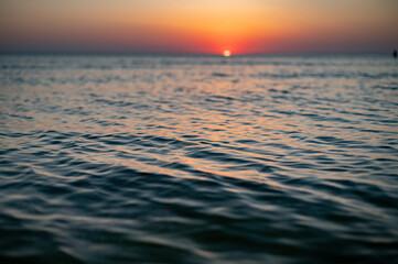 Obraz premium Close up of sea surface on sunset. Water background
