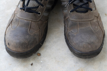 Heavy duty safety shoes, dirty shoes