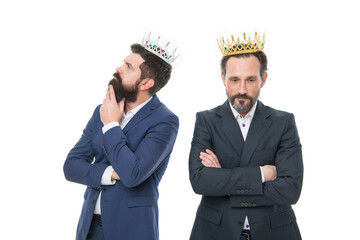 They are both winners. Prize winners isolated on white. Successful businessmen wear crowns....
