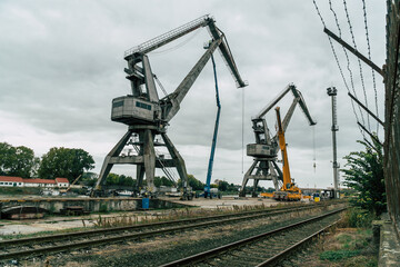 Fototapeta na wymiar dismantling an old port crane 