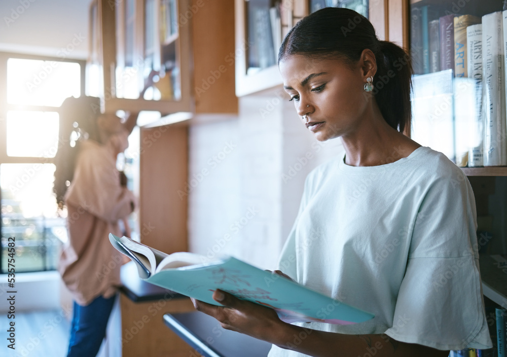 Poster woman, student and reading a book in library for education, learning and knowledge indoors. focused 