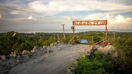 Obraz premium Scenic view of Alejo's Peak park with a sign in Bogo, Cebu, Philippines