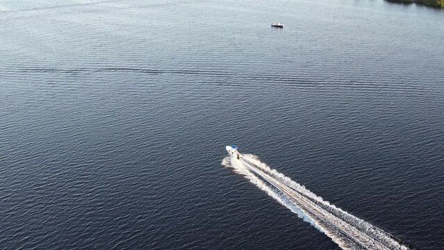 Aerial view of a boat riding in the Down Manatee River, Florida