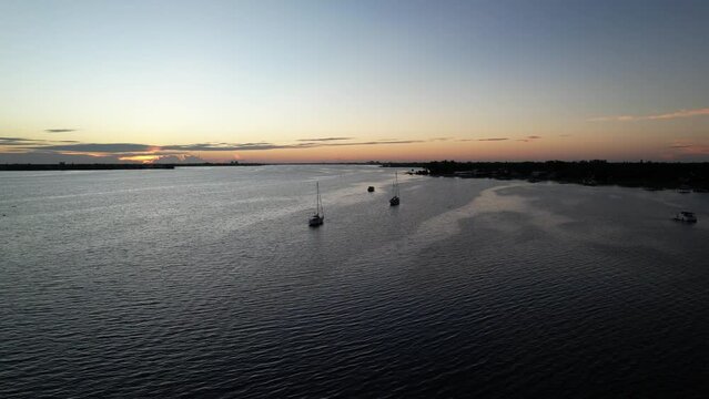 Aerial view of boats sailing in the Down Manatee River at sunset, Florida