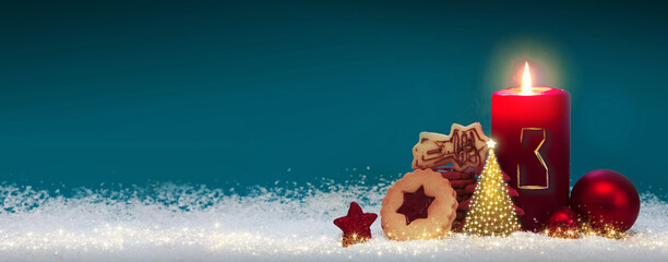 Third Advent. Christmas background with Advent candle and decoration.