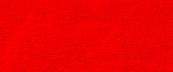 Red textured concrete wall background, grunge dark royal red color abstract paper or marbled granite stone rock wall texture background with grain distressed design. 