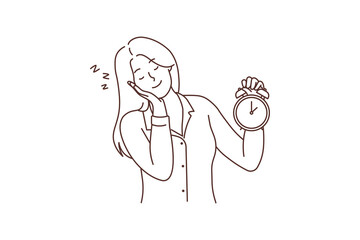 Sleepy woman with clock 