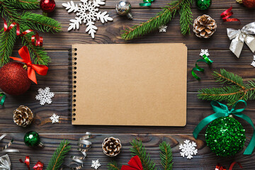 Christmas blank greeting card mock-up scene. Creative layout made of Christmas tree branches and...