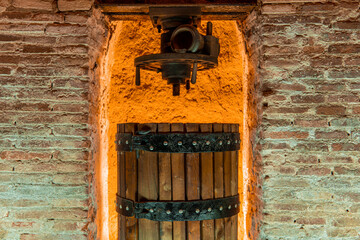 traditional wine press and tank on winery