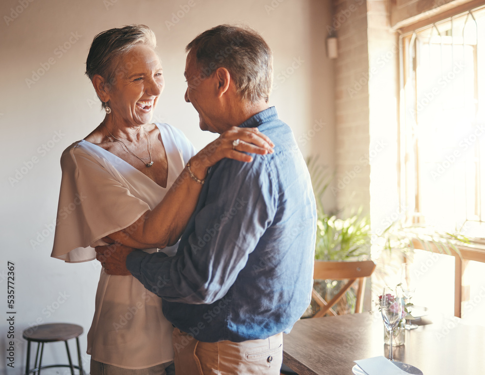 Sticker Dance, freedom and retirement with senior couple dancing in celebration, having fun and bonding in living room. Fun, romance and active seniors sharing a funny joke and enjoying retired lifestyle