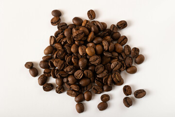 Coffee beans on a white background. View from above.