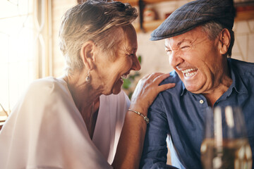 Senior, couple and laugh after comic joke together in restaurant for bonding time. Smile, man and woman in retirement laughing at funny conversation with love, happiness and comedy in cafe with wine - obrazy, fototapety, plakaty