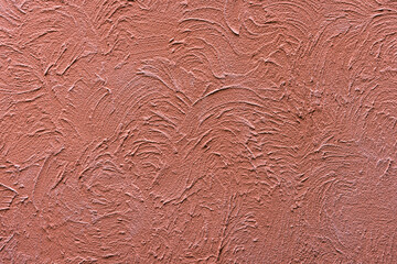 Rugged deep orange plaster wall texture background