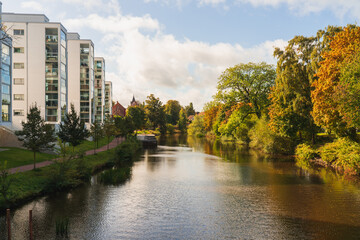 Beautiful autumn colors with Ronne river in central part of Angelholm, Sweden.