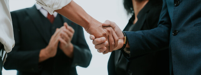 professional business people shaking hands in the office. Finishing successful meeting. businessman persons handshake with partner teamwork, concept of partnership approve a job agreements deal © chokniti