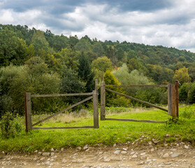 wide wooden gate in the Carpathian village