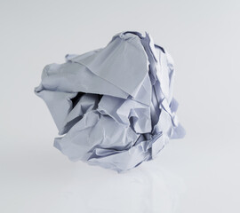 Crumpled paper ball on white background