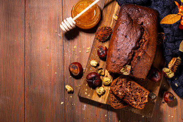 Homemade chestnut cake, sweet vegan chocolate chestnut brownie bread with honey and caramel sauce