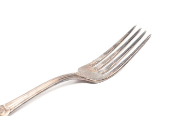 vintage silver fork isolated on white