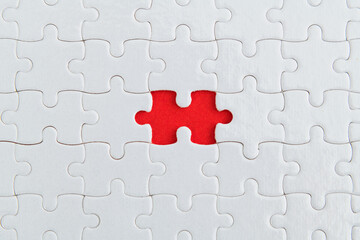 One piece of white puzzle is missing