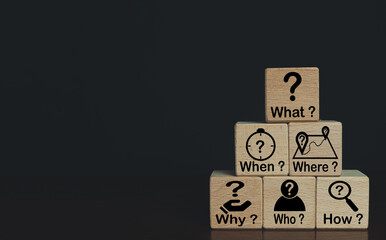 5W1H Analytical thinking with 5W1H,Root cause analysis concept.,What,When,Where,Why,Who,How text and icon on wooden cube over black background with copyspace for put text or logo.