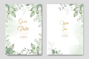 Watercolor wedding invitation card in green leaves 