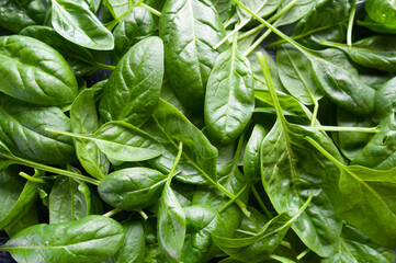 Fresh spinach leaves,  green vegetables, rustic style, healthy lifestyle, proper nutrition. Top view