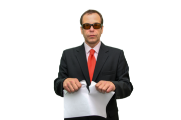 A man in a suit and tie is tearing up a piece of paper on a white background, isolate, alpha channel.