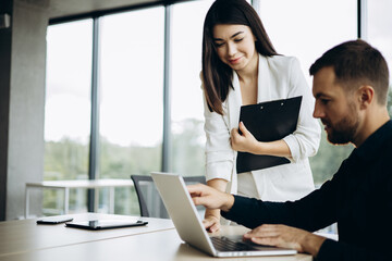 Business man with his secretary at the office