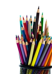 Colorful pencils in metal basket on white background