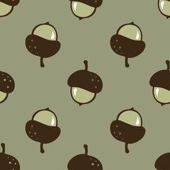 Cute hand-drawn acorns seamless pattern, a fall season pastel green background