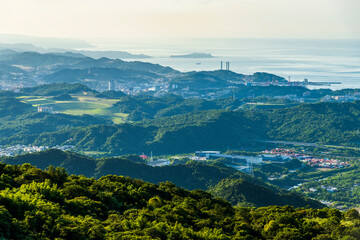 Fototapeta premium Spectacular view of the Coastal Mountains overlooking New Taipei City and Keelung in Taiwan. View of the North Coast of Taiwan.