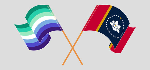 Crossed and waving flags of gay men pride and The State of Mississippi