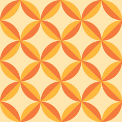 Fototapeta premium Mid century modern geometric circle leaves seamless pattern in yellow and orange. For textile, home décor, wallpaper and wrapping paper 
