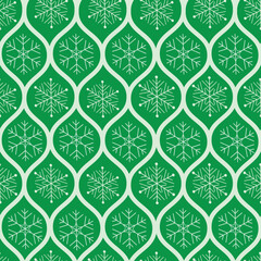 Elegant Christmas snowflakes seamless pattern on green ogee oval shapes. For Christmas wrapping paper, home décor and textile