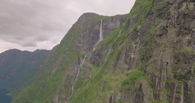 Majestic Mountains With Kjelfossen Waterfall Near Gudvangen Village, Aurland Municipality, Vestland County, Norway. Aerial Drone