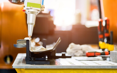 Robotic arm for engraving in factory