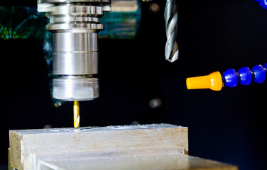 CNC machine drill on metal