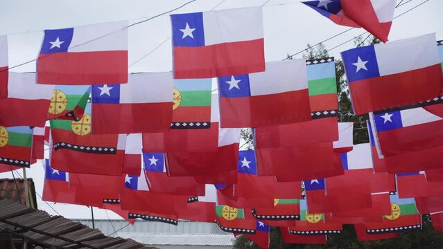 Small Chilean Flags Hanging Over The Street In Pomaire, Melipilla, Chile. close up, low angle