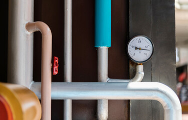 Close up of manometer on the hydraulic equipment