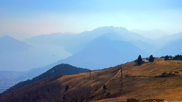 Lepontine Alps in haze from Cimetta Mount, Ticino, Switzerland